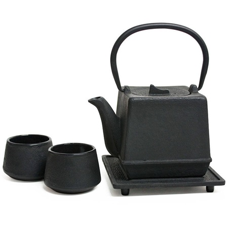 tea cups black cast iron teapot